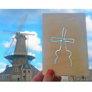 lasered wooden postcard of the windmill in delft